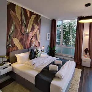 https://live-near-the-park-and-river-in-beautiful-munich.getmunichhotels.com